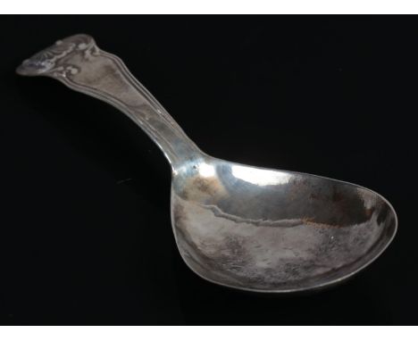 A silver caddy spoon, hallmarked worn, 9.5g.  