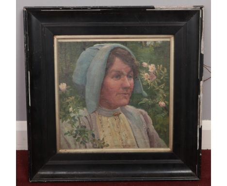 An oil on canvas signed by the artist W R E Goodrich dated 1914. The painting depicts a woman with bonnet. H: 30cm, W:30cm.  