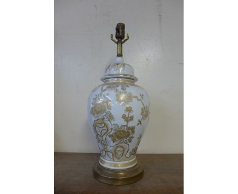 A Chinese white and gilt porcelain table lamp