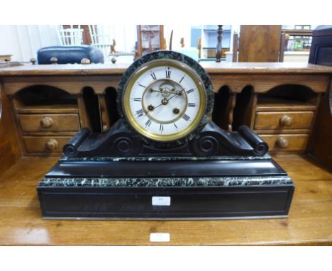 A 19th Century French Belge noir mantel clock, the movement signed S. Marti &amp; Cie.