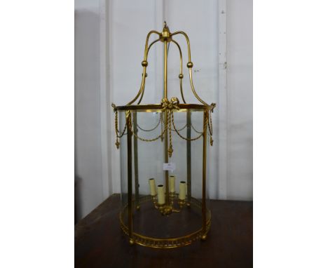 A Neo-Classical style gilt metal cylindrical lantern