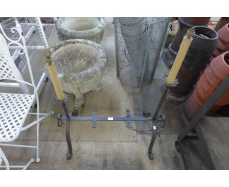 A wrought steel double lamp