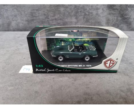 Edison Giocattour #8702221 Triumph Spitfire Mkiv 1974 Diecast Model In Acrylic Display Case This Triumph Spitfire MKIV Cabrio