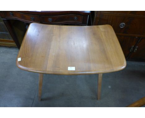 An Ercol Blonde elm and beech side table 