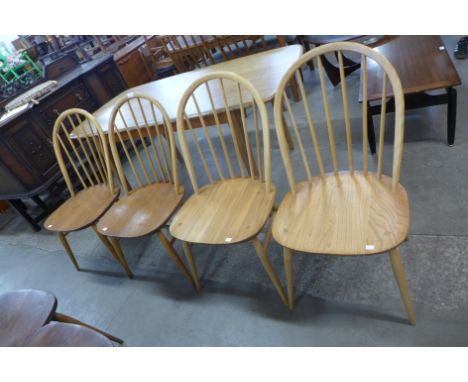 A set of four Ercol Blonde elm and beech Windsor chairs 