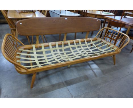 An Ercol Blone elm and beech 355 model studio couch 