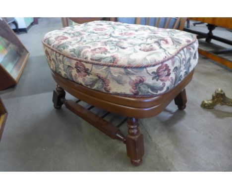 An Ercol beech footstool 