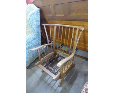 An Ercol style beech rocking chair 