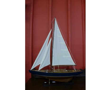 A scale model of a fully rigged yacht