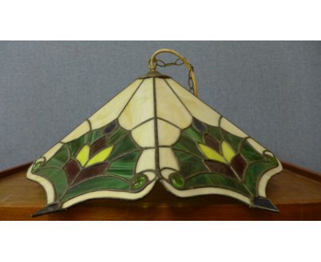 A Tiffany style glass light shade 