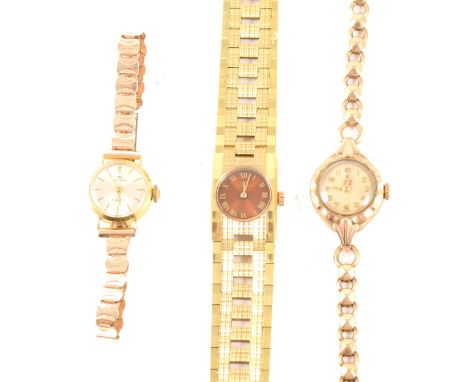 Rolex Tudor Royal and Bucherer - a lady's 9 carat yellow gold Rolex Tudor Royal bracelet watch, round champagne colour dial w