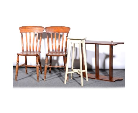 A pair of stained wood lath-back kitchen chairs, solid seats, turned legs, 91cm; set of open wall shelves, and a painted urn 