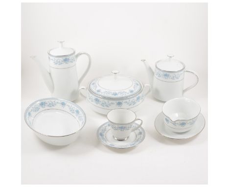 An extensive Noritake fine china table service, Blue Hill pattern, including dinner ware, breakfast ware and tea ware.