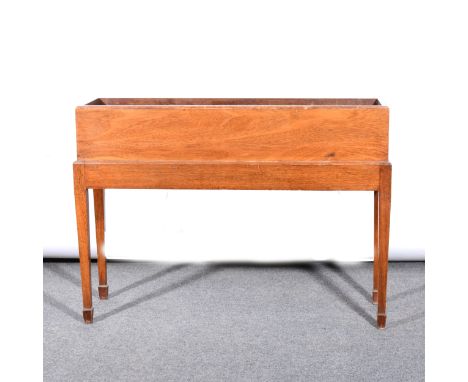 An Edwardian mahogany trough-shape jardinière, rectangular section, square tapering legs, 89cm x 25cm.