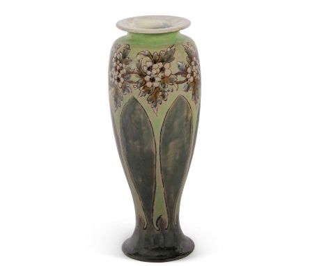 A Royal Doulton vase by Elisa Simmance decorated with flowers in a Art Nouveau style on green ground, 28cm high