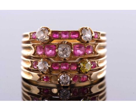 A diamond and ruby ring, the four bands set with mixed cut rubies, old mine cut diamonds, estimated approx. 0.50cts, and an o