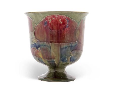 William Moorcroft for Liberty &amp; Co, an early 20th century urn shaped vase decorated with the Claremont pattern on a green