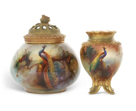 A Royal Worcester globular vase with pierced cover painted with a peacock signed by F J Bray together with a matching small v