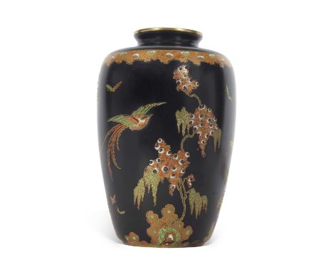 An early Carlton ware Famille Noire vase decorated in Art Deco style with a pheonix amongst flowing trees, 22cm high