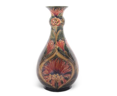 A good early 20th century Moorcroft vase of baluster shape with collar neck, decorated with the revived cornflower pattern fa