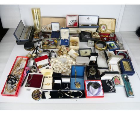 A large collection of costume jewellery, vintage pens, wristwatches etc.