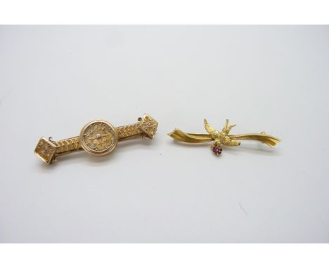 A Victorian Etruscan Revival yellow metal brooch and a Victorian 15ct yellow gold ruby set brooch, total weight 5.4g