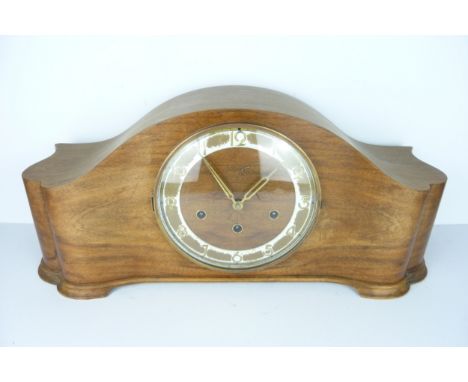 An Art Deco walnut mantel clock