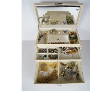 A jewellery box containing assorted costume jewellery, a 9ct gold and coral ring, a D'Orlan designer necklace etc.