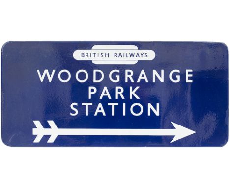 BR(E) FF station direction enamel sign WOODGRANGE PARK with British Railways totem in the top and right facing arrow. In good