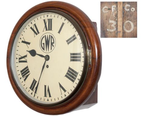 Cardiff Railway 12in oak cased chain driven fusee railway clock. The oak case with eight piece surround has two side doors an