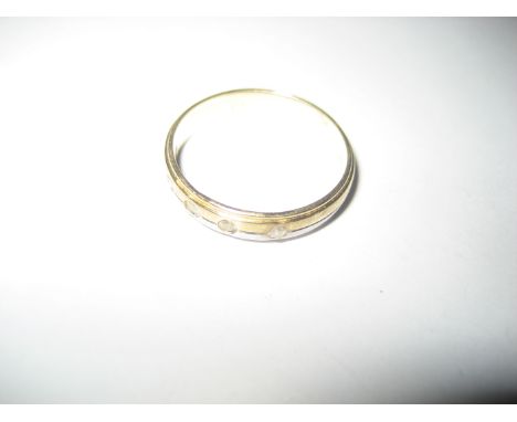 A two tone gold and diamond ring  stamped 750 to shank, 3.6g all in.