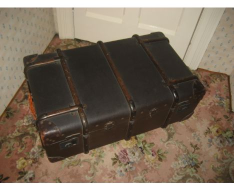 An early 20th century cabin trunk.