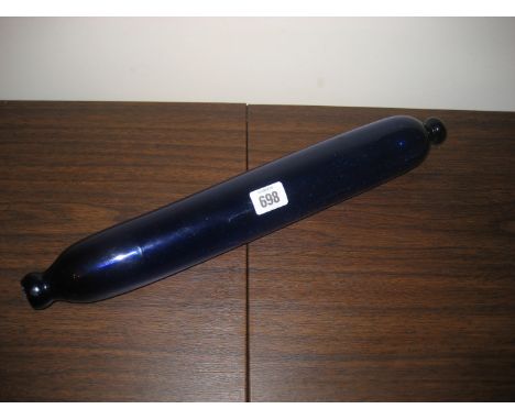 A 19th century blue glass rolling pin