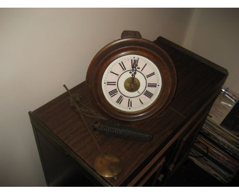 A late 19th century Blackforest Postman's alarm clock with one weight