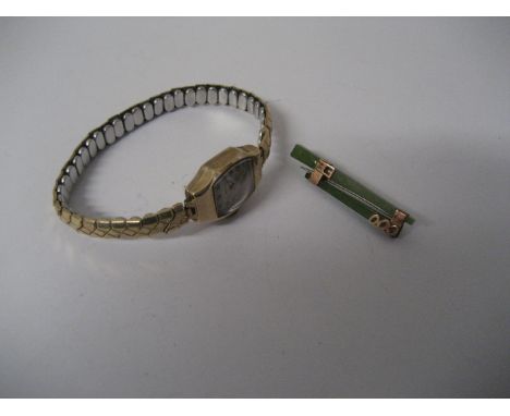 A 9ct gold ladies watch, stamped 375 to case rear and a jade type 9ct gold brooch (2).