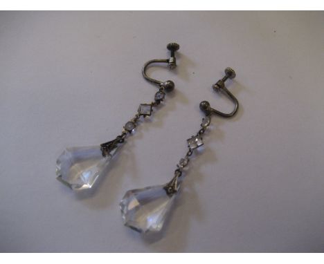 A pair of vintage earrings.