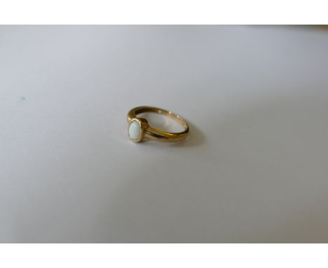 A 9ct gold white stone ring, (1.7g all in). 