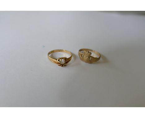 A yellow metal ring and another (marks rubbed), (4.4g all in). 
