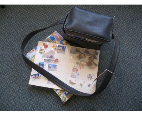 A collection of stamps (some unused) and a poloroid camera (2).
