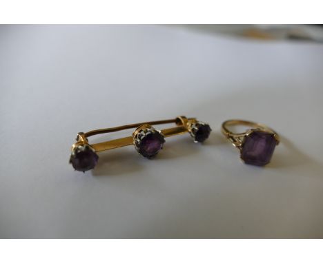 An amethyst 3 stone bar brooch together with a 9ct gold ring  similar (2). 