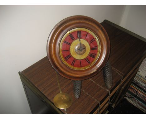 A late 19th century Blackforest Postman's alarm clock with two weights