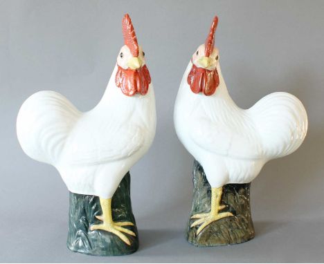 A Pair of Chinese Porcelain Chickens, 20th century, naturalistically modelled and painted, 40cm highOne with a small section 