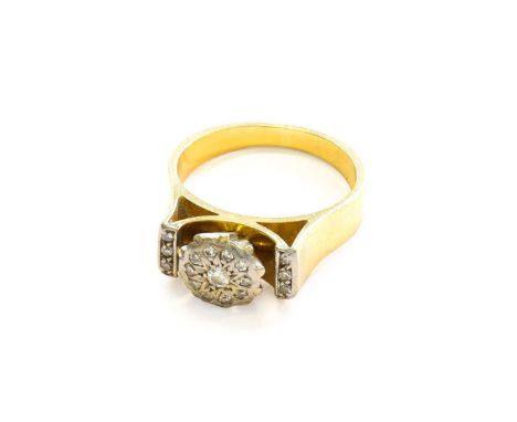 A Diamond Cluster Ring, stamped '18CT' and 'PALL', finger size KGross weight 6.0 grams.