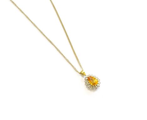 A Yellow Sapphire and Diamond Cluster Pendant on Chain, the pear shaped yellow sapphire within a border of round brilliant cu