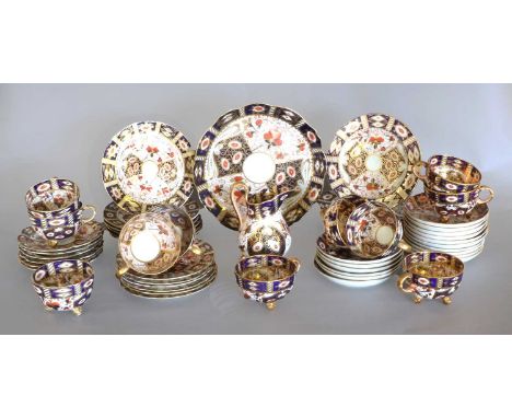 A Composite Davenport and Other Imari Pattern Tea Service, late 19th century, comprising, 1 cream jug, 11 teacups, 22 saucers