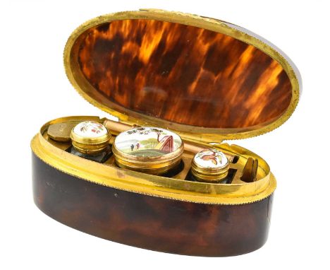 A George III Gilt Metal Mounted Tortoiseshell Travelling Writing Necessaire, of oval form with shell-cast thumbpiece, contain