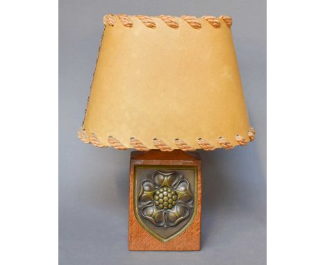 A Yorkshire Oak Table Lamp, of adzed wedge form and with a Yorkshire rose motif, on a sheild plaque, label to the reverse ''m