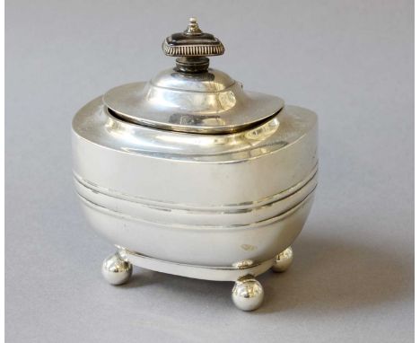 A George V Silver Tea-Caddy, by Thomas Bradbury and Sons Ltd., Sheffield, 1919. oblong and on four ball feet, the hinged cove