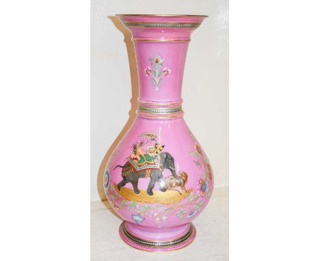 A Paris Porcelain Baluster Vase, 19th century, painted with an Indian hunting scene on a pink ground, 43cm highRestored