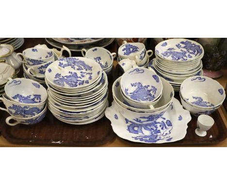 A Coalport Porcelain Part Tea Service. printed in underglaze blue with dragons and cloud scrolls, printed marks, including tw